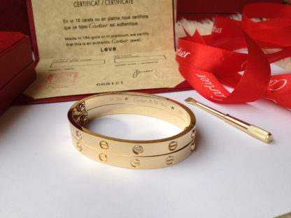 Yellow gold Cartier love bracelet 4 diamonds