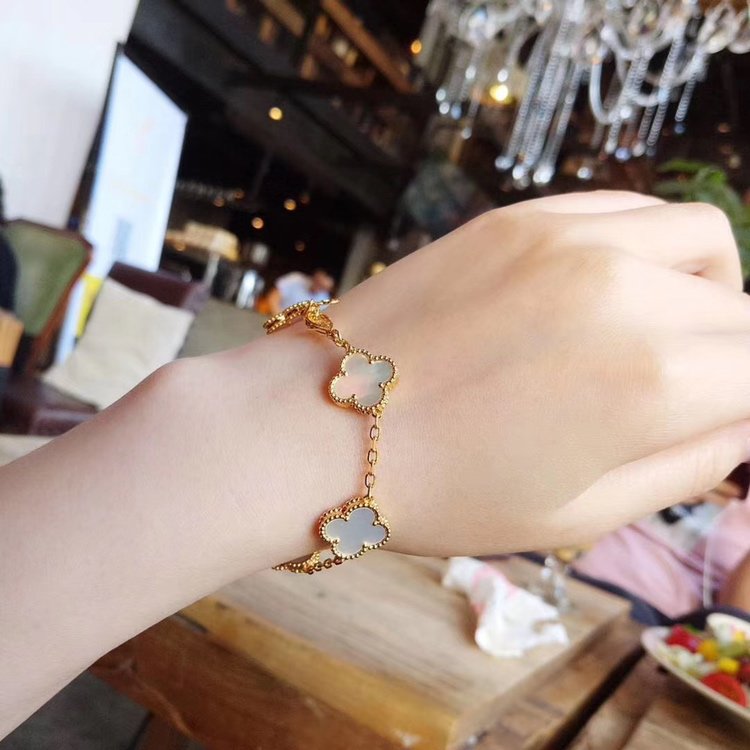 Vintage Alhambra bracelet, 5 motifs yellow gold white mother-of-pearl VCARA41800 Vintage Alhambra bracelet, 5 motifs yellow gold white mother-of-pearl VCARA41800