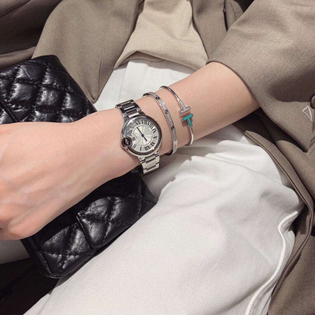 Stacking Ideas: Cartier love bracelet, Ballon Bleu De Cartier Watch and Tiffany T Wire Bracelet