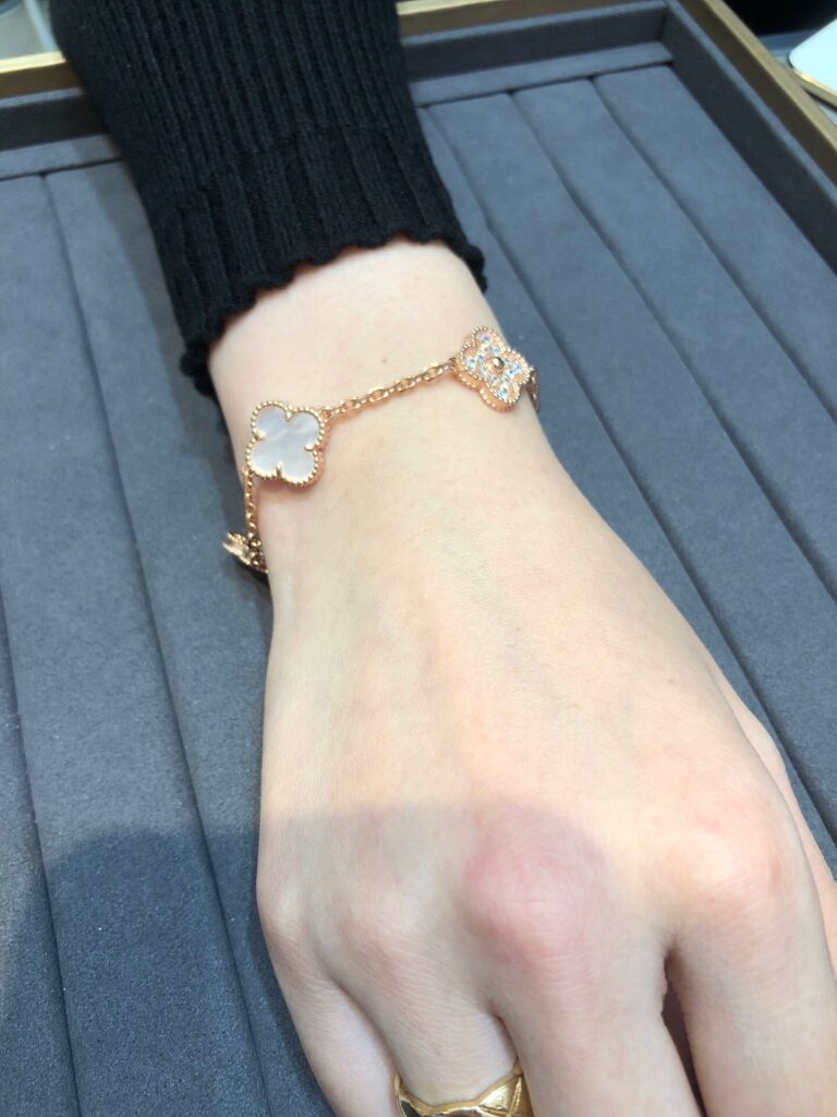 Pink gold, Mother-of-pearl. VAN CLEEF Alhambra bracelet, 5 motifs