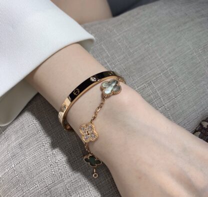 Van Cleef Bracelet stack Cartier love bracelet