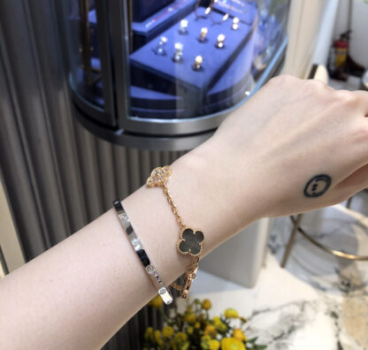 Van Cleef Bracelet stack Cartier love bracelet