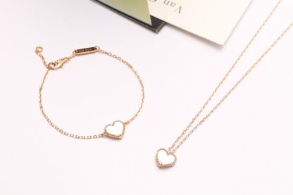 Van Cleef Sweet Alhambra Heart Bracelet and necklace white mother-of-pearl yellow gold