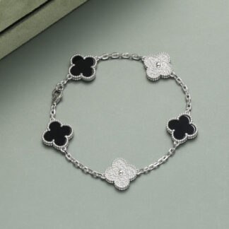 Van Cleef Vintage Alhambra bracelet, 5 motifs, white gold, black onyx, diamonds