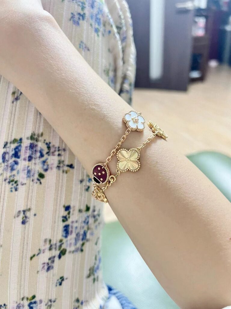 The VCA Vintage Alhambra 5 motifs bracelet looks great stacked with any bracelet