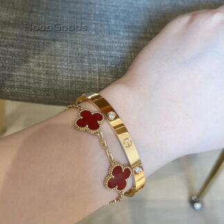 VCA Vintage Alhambra bracelet 5 motifs Carnelian stacking with Cartier Love bracelet yellow gold