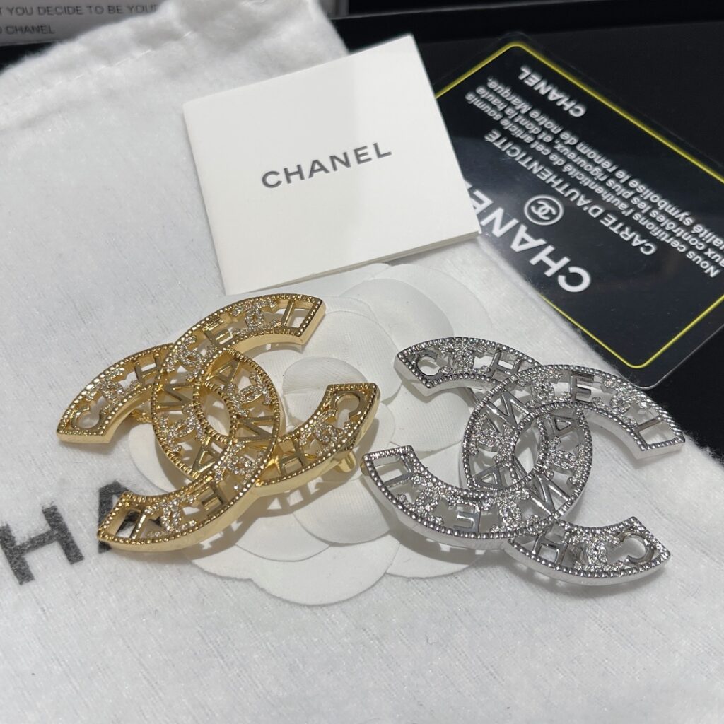 CHANEL DOUBLE CC LOGO BROOCHES