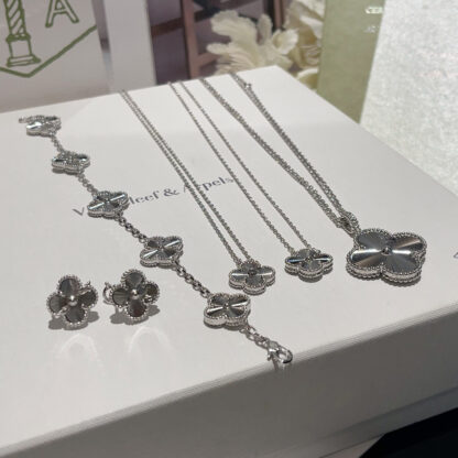 VCA Vintage/Magic Alhambra guilloche Collection in white gold: bracelet, necklace and earrings